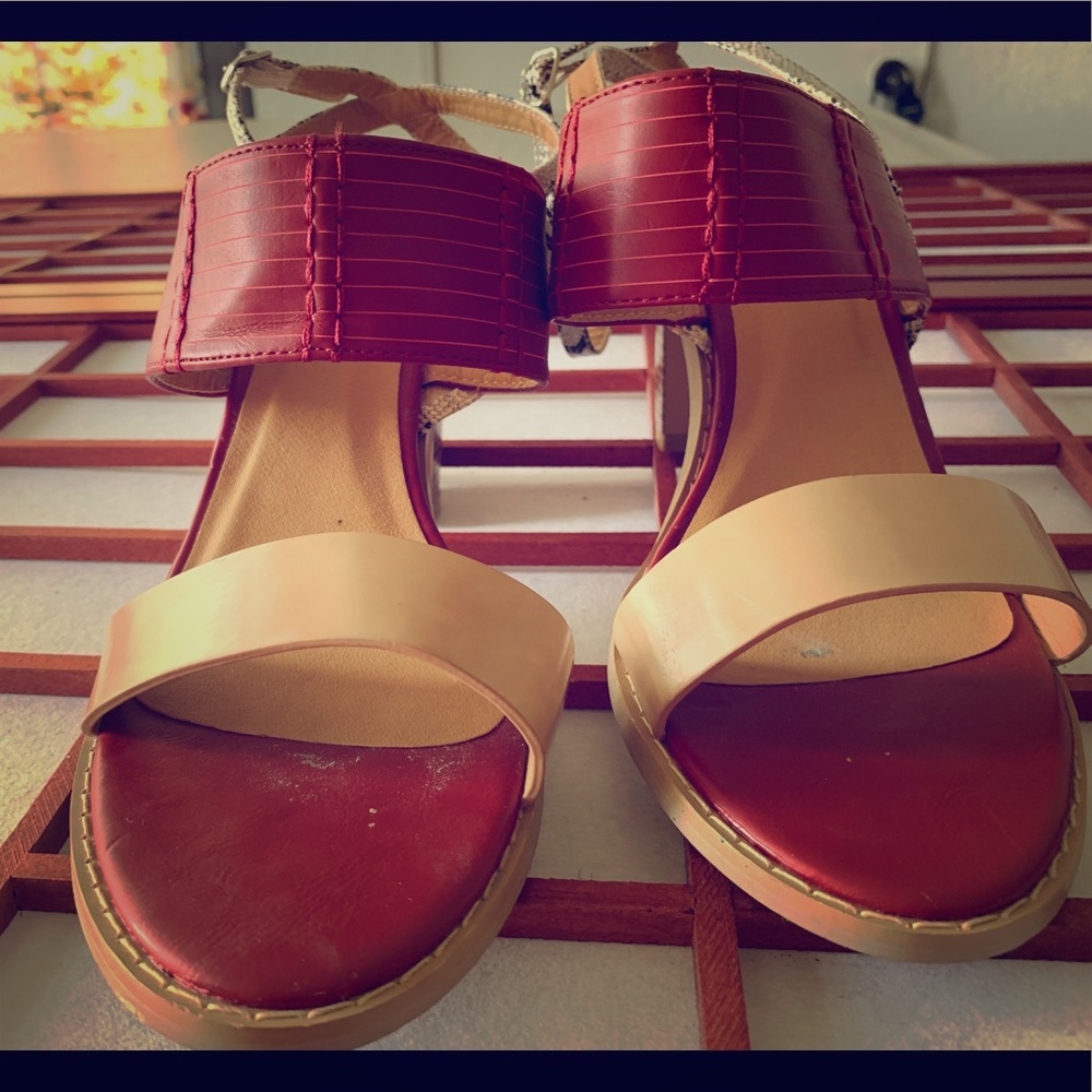 Women’s red and tan leather sandals